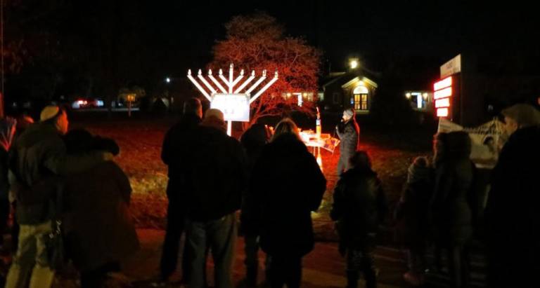 Rabbi Mendy Gurkov of the Chabad Center for Jewish Life facilitated the menorah lighting celebration in West Milford this past Monday.