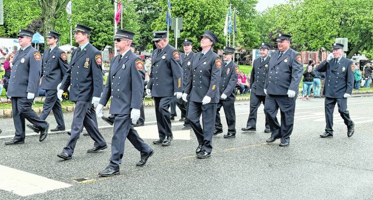 The West Milford Fire Dept. marches in the parade.