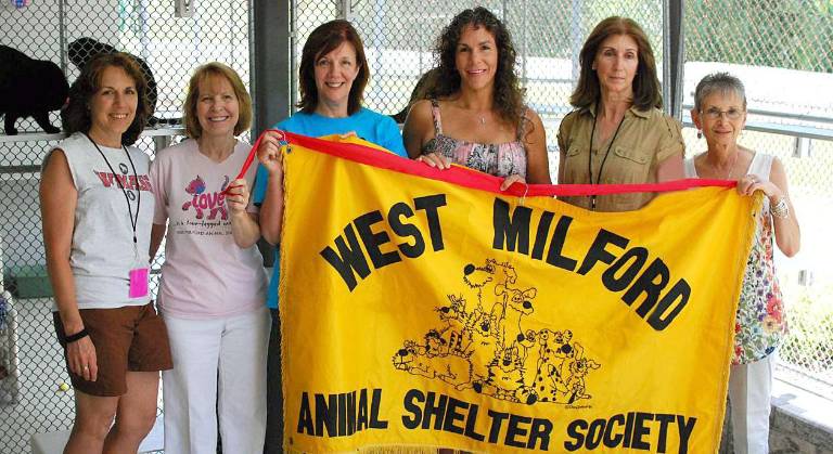 Photo provided Mayor Bettina Bieri, also a shelter board member, is joined by current and past volunteer board members at the grand opening of the catteries. From left, Corinne Brown, secretary, Glory Bracken, fundraising/advertising director, Terri Nelson, vice president, Bieri, health officer, Jean Bremy, president and Diane Duciewicz, acting treasurer .