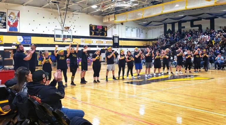 West Milford teachers show their spirit as they take on the Harlem Wizards in a fundraising game, sponsored by the Paradise Knoll School PTA.