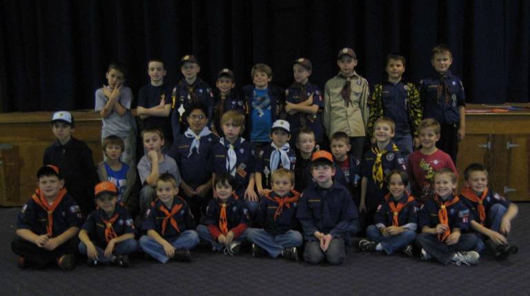 Members from Cub Scout Pack 51 are pictured here. The boys are gearing up for their annual food drive.