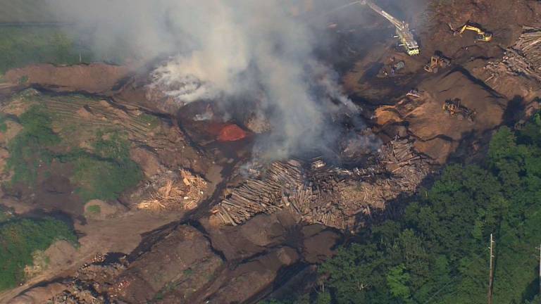 Courtesy: News 12 New Jersey This aerial view shows the July 18 fire at the compost pile, located in the West Milford Recycling Center on Lycosky Drive.