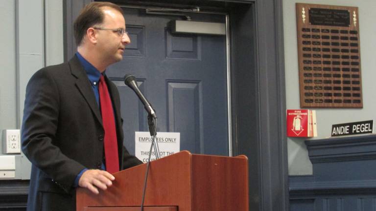 Newly appointed Passaic County Engineer Jonathan Pera tells the Township of West Milford Council that reconstruction of the Marshall Hill culvert will begin on July 1.PHOTO BY ANN GENADER