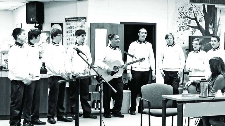 The West Milford High School Master Singers men's choir entertained the school board and the public at the Feb. 19 board of education meeting. The group is directed by high school music teacher/choral director Douglas Heyburn.