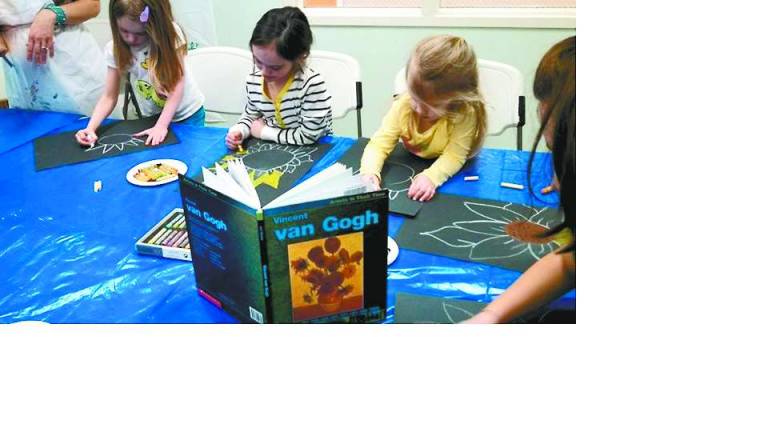 Children participate in art and athletic fun.