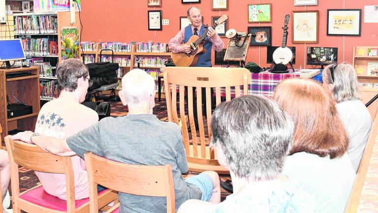 Richard Stillman performs.