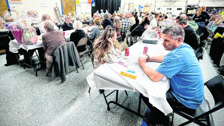 The West Milford Rescue Squad building was packed with people attending the beef steak fundraiser for the Babcock family.