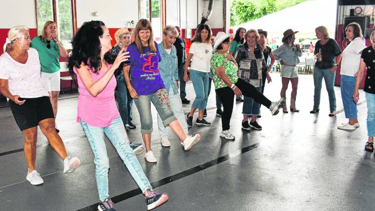 Participants dance.