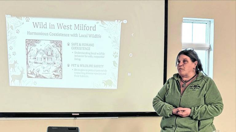 Nancy Walker, president of The Last Resort Wildlife Refuge gives a presentation at the West Milford Library.