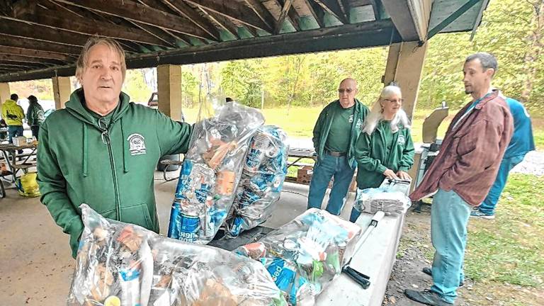 JB1 James Bennett holds up bags of litter picked up from West Milford roadsides Saturday, Oct. 11. (Photos by Rich Adamonis)