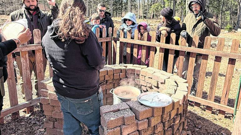 A demonstration of how maple sap is turned into maple syrup by boiling.