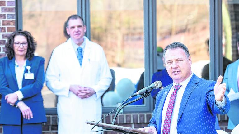 Hackensack Meridian Health President and CEO Mark Sparta speaks at the podium.