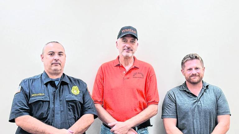 From left, Michael Moscatello of Emergency Management, Chief Claude Jaillet, and Deputy Chief Will Test.