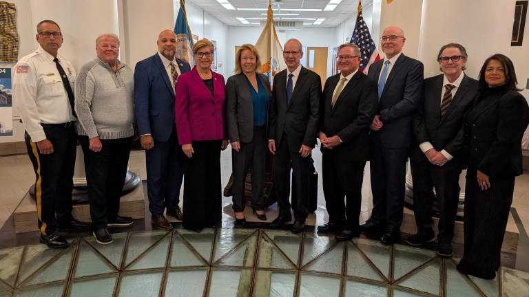 Sheriff Thomas Adamo, Passaic County Commissioner Nick Veliky, Passaic County Commissioner Deputy-Director Orlando Cruz, Congresswoman Nellie Pou, Passaic County Commissioner Director Sandi Lazzara, Chief Justice Stuart Rabner, Judge Michael Blee, Assignment Judge Rudolph Filko, retired Assignment Judge Ernest Caposela and Passaic County Surrogate Zoila Cassanova.