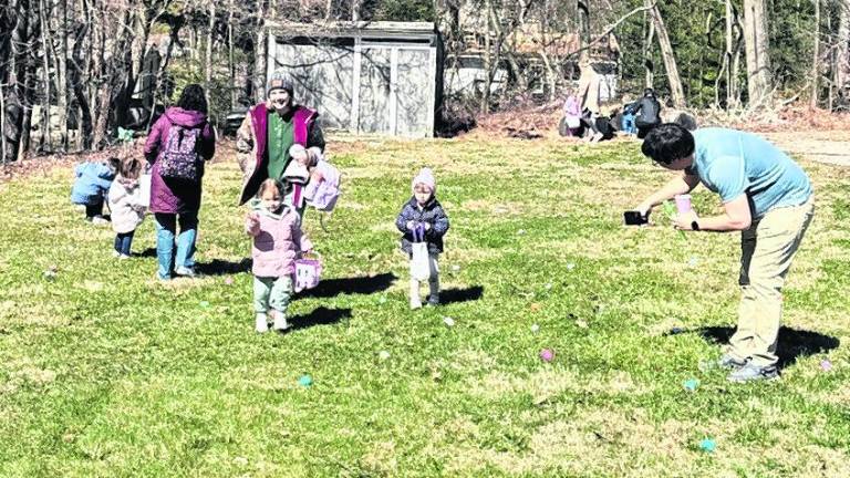 Children hunt for Easter eggs at Highlands Community Church on March 28.,