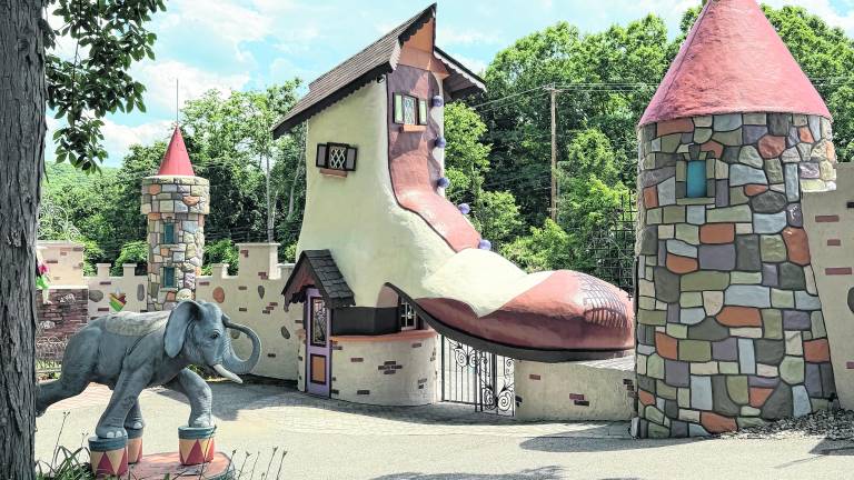 A gate based on “The Old Lady in the Shoe” is shown.
