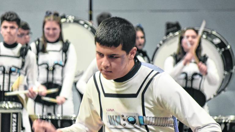 Members of the Highlander ensemble perform during the 2026 USBands Indoor Percussion New Jersey scholastic circuit kick-off event at West Milford High School, earning top score of 76.250 with its Stowaway’ theme on Saturday, Feb. 21.