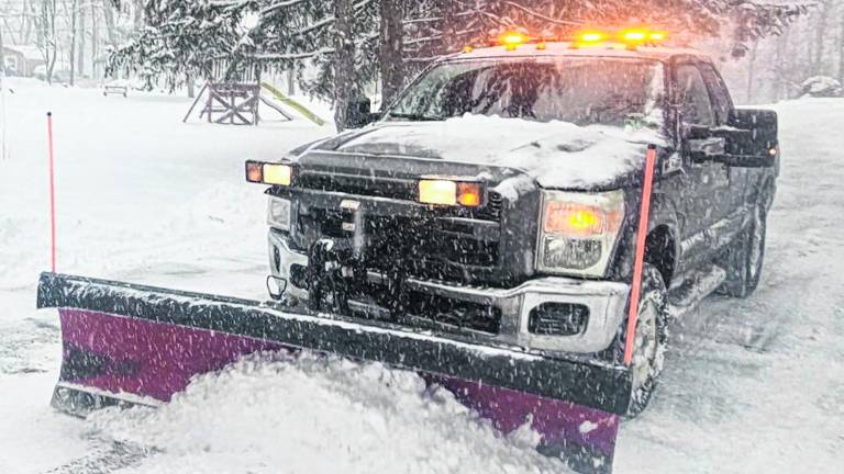 Plow trucks moved heavy volumes of snow from roadways throughout snowstorm duration and after.