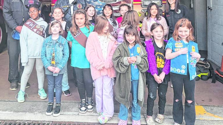 Girl Scout Troop 98821 visits Upper Greenwood Lake Company 5 Fire Dept. to earn badges to learn how to be safe during a fire and how firefighters are courageous and strong.