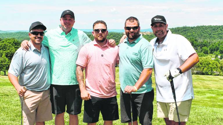 Jim Mandara, Tim Jacobsen, Jesse Soehngen,john Ragonese and Mark Palmieri, all of West Milford pose for a photo.