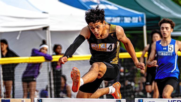 Lorenzo Andrade leaps in the 400-meter hurdles at the NJSIAA North Jersey, Section 1, Group 2 Championships. He won silver. (Photos by TJ Nolan)