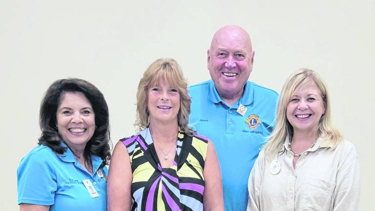 Pictured from left are Sponsor Barbara Corsaro, Flo McClellan, Club President James Kenny, and Lions District Governor SuzAnne Pacala