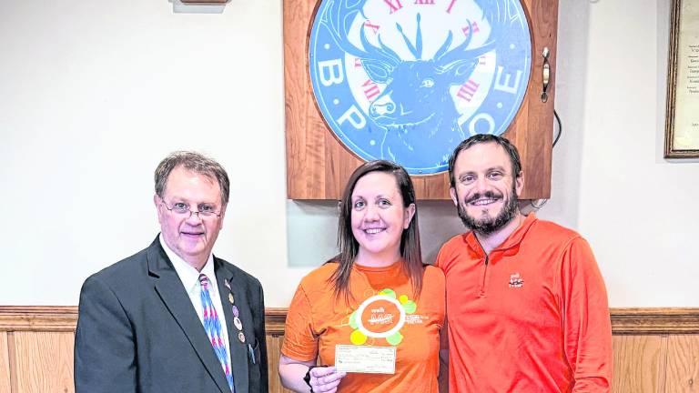 From left, Kenneth Hensley, District Deputy Grand Exalted Ruler, New Jersey Elks North District, Lyndsay Wright and Chris Wright.