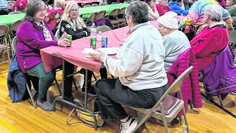 West Milford Senior Citizens enjoyed pizza sponsored by the West Milford Recreation Center and entertainment presented by the Junior High School Choir and band.
