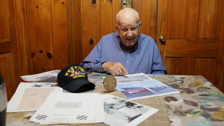 Arthur Hansen of Lake Lookover is seen with the Congressional Medal of Honor that he recently received for service to the nation during World War II.
