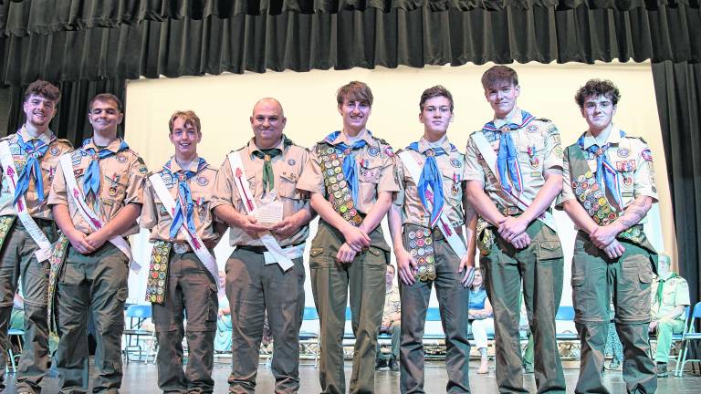 Scoutmaster Jimmy DaSilva, center is shown with Troop 151’s seven near Eagle Scouts.