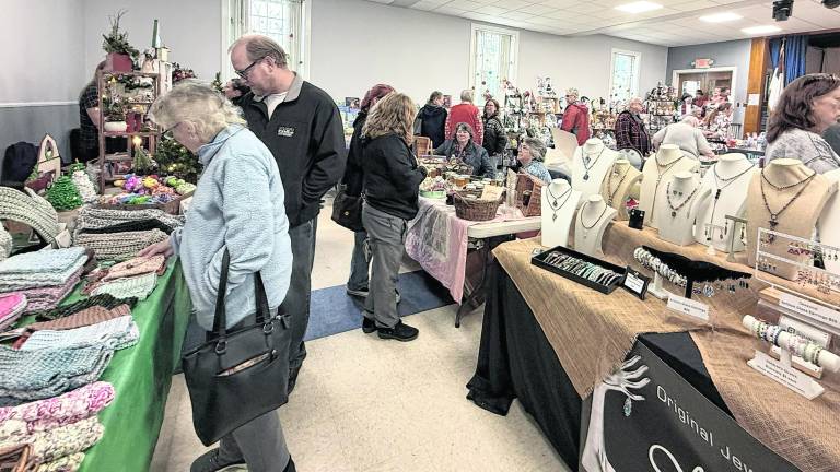 Visitors peruse the Christmas Craft Fair.